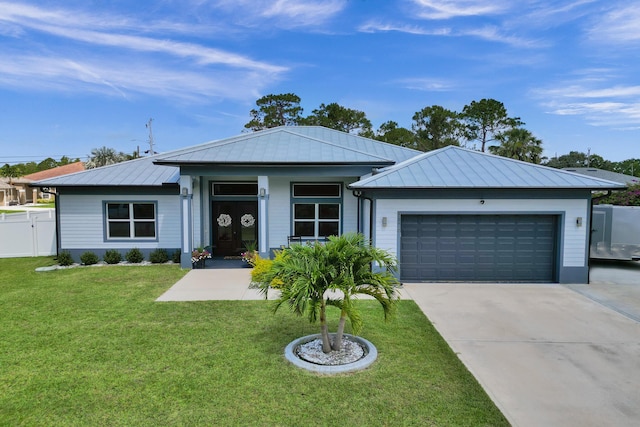 5476 NW Cambo Ct, Port Saint Lucie, FL 34986 - single story home with a garage, driveway, a standing seam roof, and a metal roof