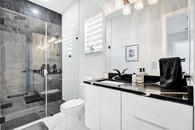 5476 NW Cambo Ct, Port Saint Lucie, FL 34986 - bathroom featuring marble finish flooring, vanity, and a stall shower