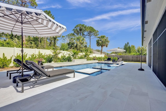 5476 NW Cambo Ct, Port Saint Lucie, FL 34986 - view of swimming pool with a patio and a fenced backyard