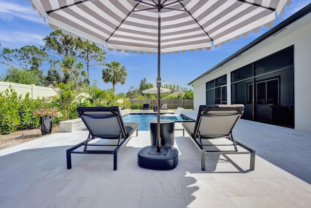 5476 NW Cambo Ct, Port Saint Lucie, FL 34986 - fenced backyard featuring a patio area