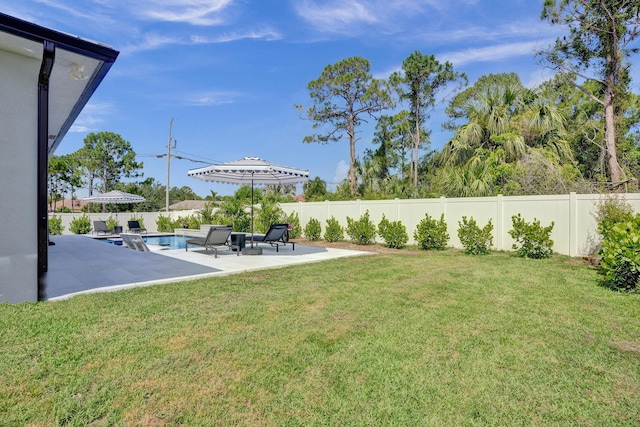 5476 NW Cambo Ct, Port Saint Lucie, FL 34986 - fenced backyard with a patio