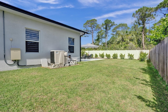 5476 NW Cambo Ct, Port Saint Lucie, FL 34986 - fenced backyard with a patio area