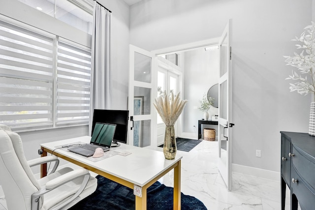 5476 NW Cambo Ct, Port Saint Lucie, FL 34986 - office area featuring marble look tile flooring and baseboards