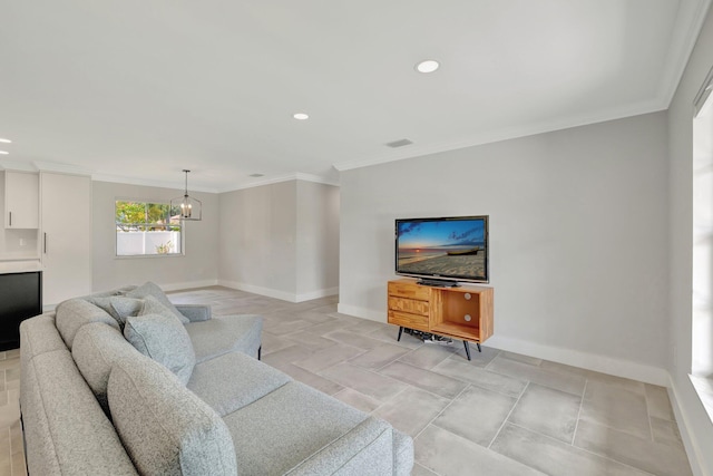 208 SW Langfield Ave, Port Saint Lucie, FL 34984 - living room with recessed lighting, a chandelier, and ornamental molding