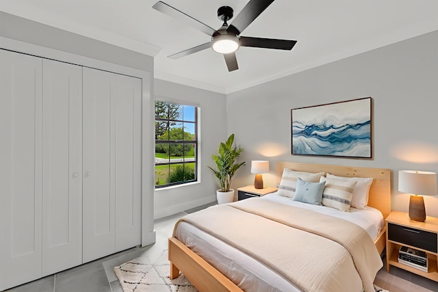 208 SW Langfield Ave, Port Saint Lucie, FL 34984 - bedroom featuring ceiling fan, crown molding, light tile patterned floors, and a closet