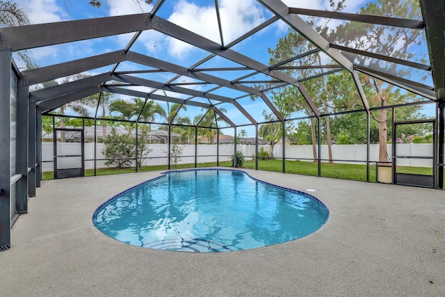 208 SW Langfield Ave, Port Saint Lucie, FL 34984 - view of pool with a patio area, a fenced backyard, and glass enclosure