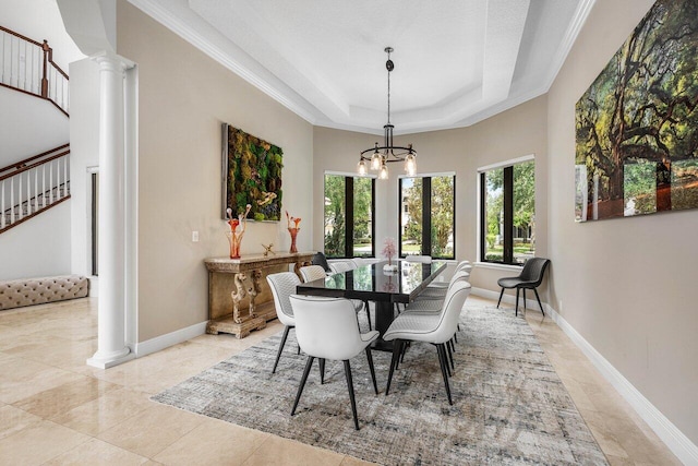 8984 Three Rail Dr, Boynton Beach, FL 33472 - dining area with a chandelier, decorative columns, stairs, and a tray ceiling