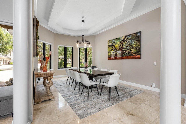 8984 Three Rail Dr, Boynton Beach, FL 33472 - dining room featuring decorative columns, a chandelier, a raised ceiling, and crown molding