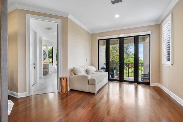 8984 Three Rail Dr, Boynton Beach, FL 33472 - living area with dark wood-style flooring, ornamental molding, and recessed lighting