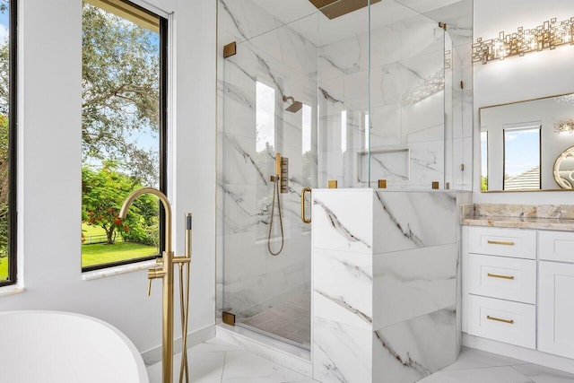 8984 Three Rail Dr, Boynton Beach, FL 33472 - bathroom with plenty of natural light, a marble finish shower, vanity, and a freestanding bath
