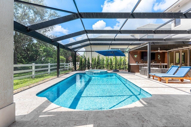 8984 Three Rail Dr, Boynton Beach, FL 33472 - view of swimming pool featuring a patio area, glass enclosure, and a pool with connected hot tub