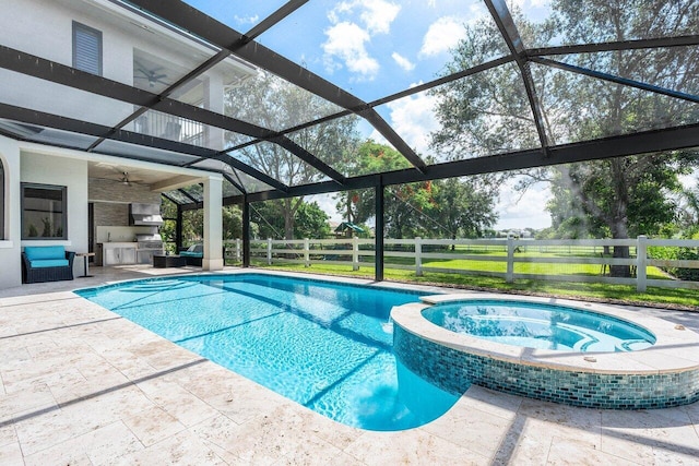 8984 Three Rail Dr, Boynton Beach, FL 33472 - view of pool featuring an outdoor kitchen, ceiling fan, a patio area, a lanai, and a pool with connected hot tub
