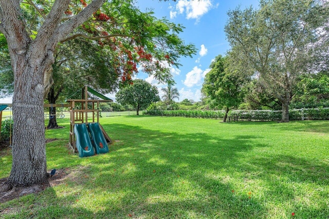 8984 Three Rail Dr, Boynton Beach, FL 33472 - view of yard featuring a playground