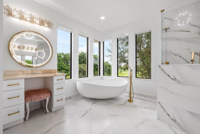 8984 Three Rail Dr, Boynton Beach, FL 33472 - full bath featuring recessed lighting, a freestanding bath, a marble finish shower, vanity, and marble finish flooring
