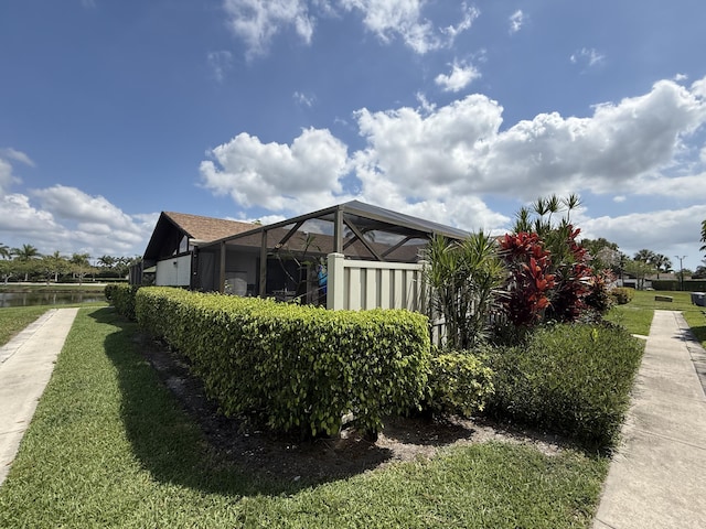 9828 Boca Gardens Trl Unit D, Boca Raton, FL 33496 - view of side of home featuring a yard