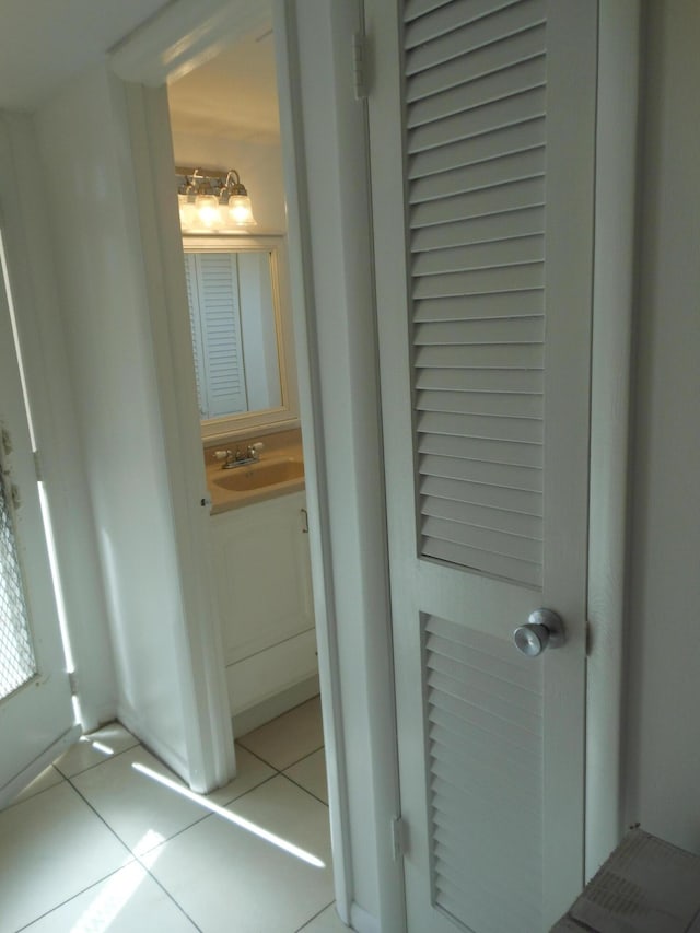 2515 NE 1st Ct Unit 117, Boynton Beach, FL 33435 - bathroom with tile patterned flooring and vanity