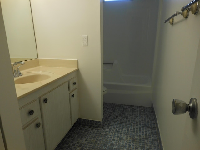 2515 NE 1st Ct Unit 117, Boynton Beach, FL 33435 - bathroom with vanity, tile patterned floors, and shower / washtub combination