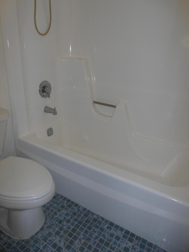 2515 NE 1st Ct Unit 117, Boynton Beach, FL 33435 - bathroom with  shower combination and tile patterned floors