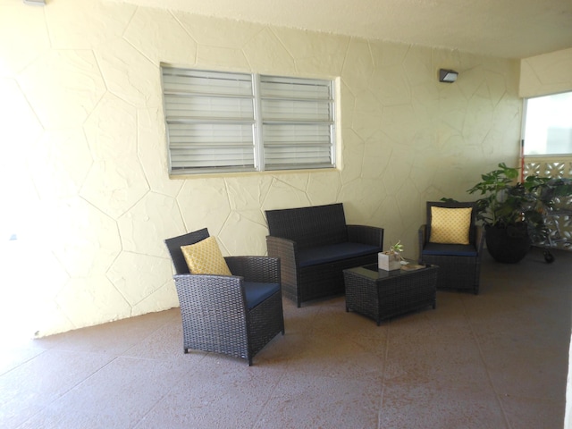 2515 NE 1st Ct Unit 117, Boynton Beach, FL 33435 - view of patio / terrace with an outdoor living space