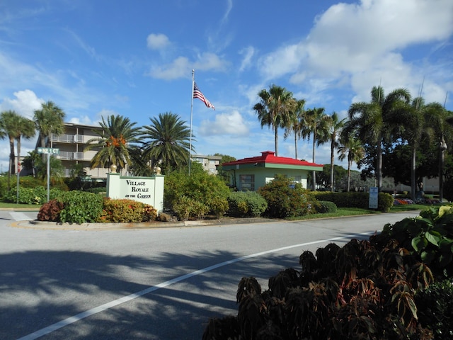 2515 NE 1st Ct Unit 117, Boynton Beach, FL 33435 - view of asphalt road featuring curbs