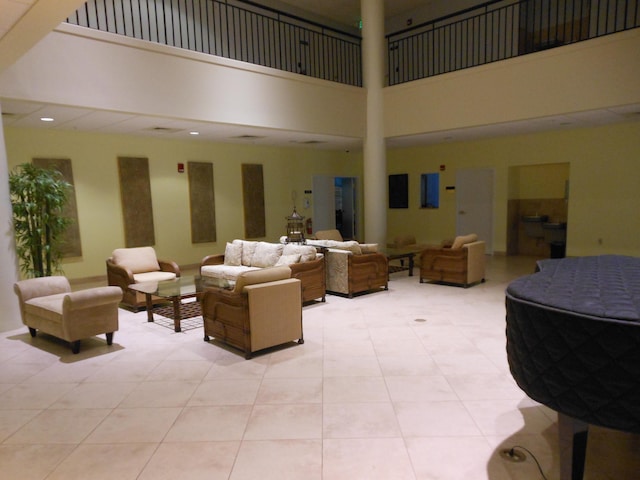 2515 NE 1st Ct Unit 117, Boynton Beach, FL 33435 - lobby with a high ceiling and recessed lighting