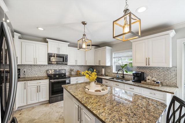 1571 SW Delos Ave, Port Saint Lucie, FL 34953 - kitchen featuring stainless steel appliances, ornamental molding, white cabinetry, tasteful backsplash, and a center island