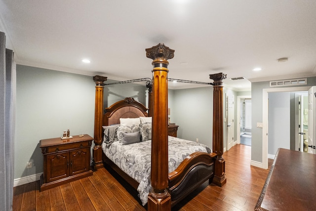 1571 SW Delos Ave, Port Saint Lucie, FL 34953 - bedroom with ornamental molding, decorative columns, dark wood finished floors, and recessed lighting