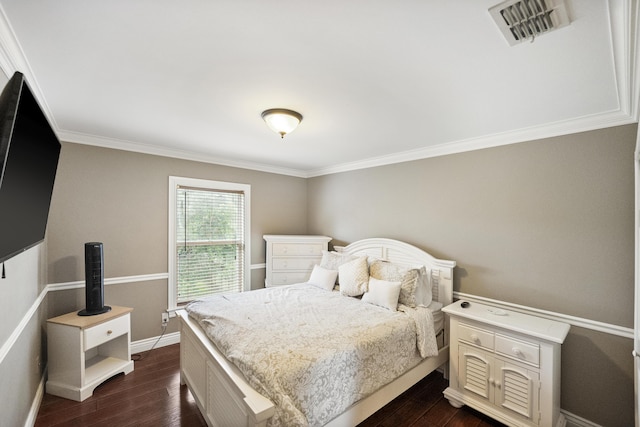 1571 SW Delos Ave, Port Saint Lucie, FL 34953 - bedroom with dark wood-style floors and ornamental molding