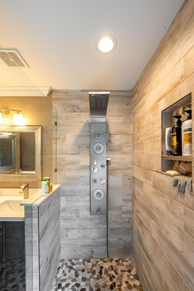 1571 SW Delos Ave, Port Saint Lucie, FL 34953 - full bath featuring wood walls, tiled shower, and vanity