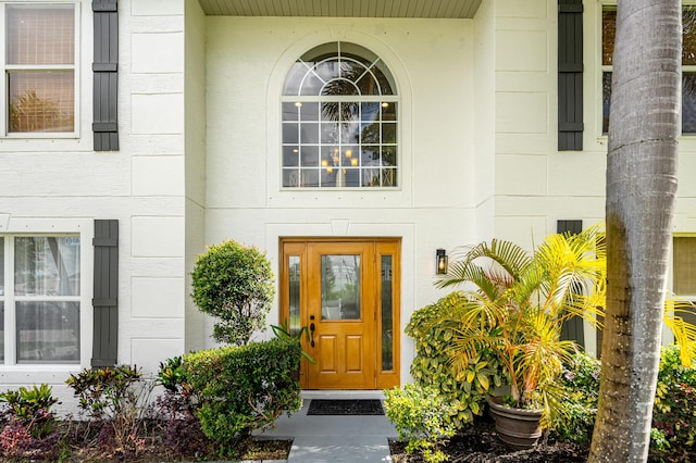 1571 SW Delos Ave, Port Saint Lucie, FL 34953 - property entrance featuring stucco siding