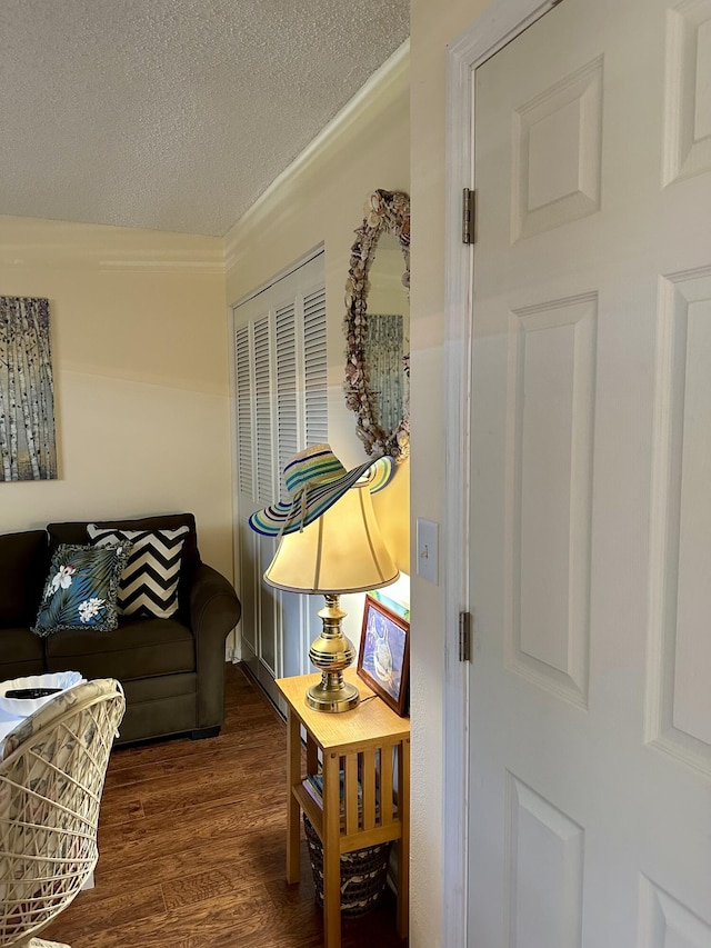 1957 SW Palm City Rd Unit B, Stuart, FL 34994 - living area featuring wood finished floors and a textured ceiling