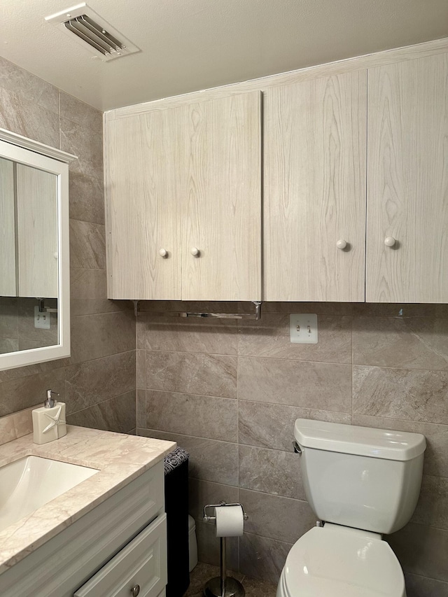 1957 SW Palm City Rd Unit B, Stuart, FL 34994 - bathroom with tile walls and vanity