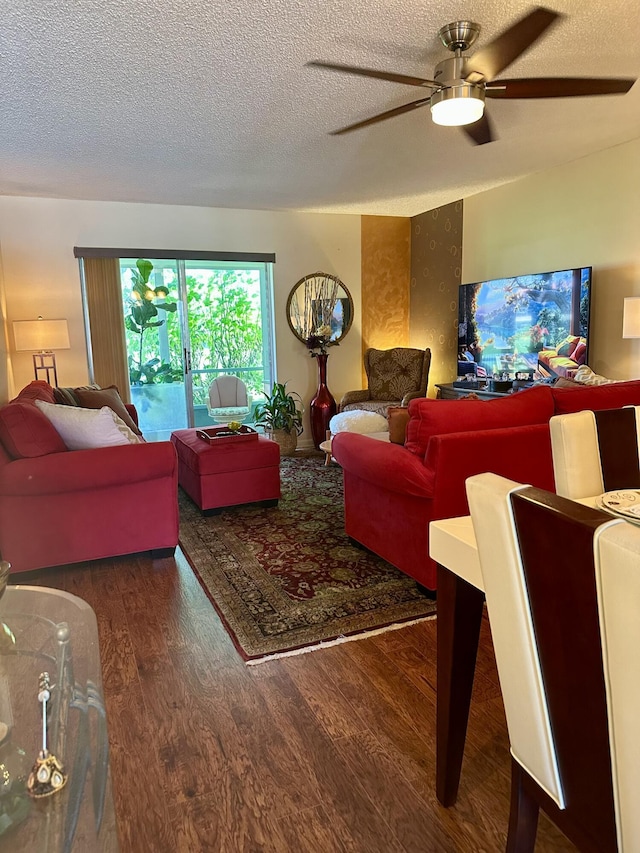 1957 SW Palm City Rd Unit B, Stuart, FL 34994 - living area featuring wood finished floors, a ceiling fan, and a textured ceiling