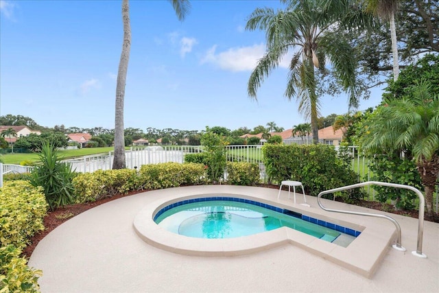 1047 Via Jardin, Riviera Beach, FL 33418 - view of pool with a hot tub
