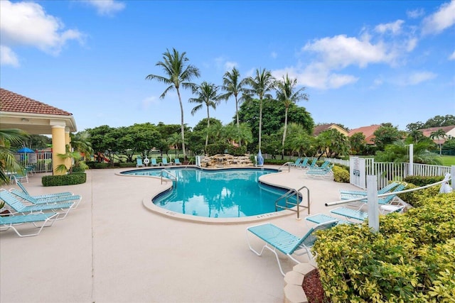 1047 Via Jardin, Riviera Beach, FL 33418 - community pool featuring a patio area