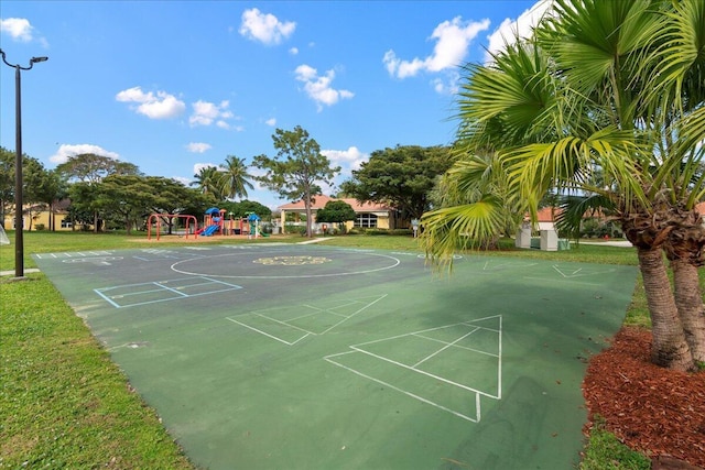 1047 Via Jardin, Riviera Beach, FL 33418 - view of home's community featuring shuffleboard and a lawn