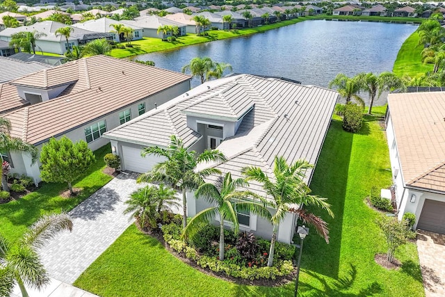 10948 SW Ivory Springs Ln, Port Saint Lucie, FL 34987 - aerial perspective of suburban area with a nearby body of water