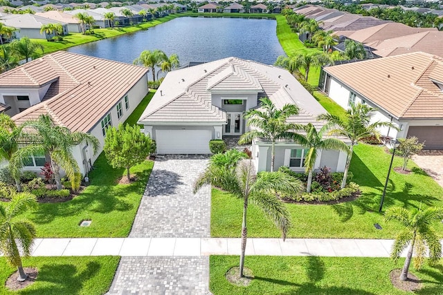 10948 SW Ivory Springs Ln, Port Saint Lucie, FL 34987 - aerial perspective of suburban area with a large body of water