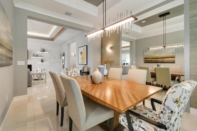 10948 SW Ivory Springs Ln, Port Saint Lucie, FL 34987 - dining room with a tray ceiling and light tile patterned floors