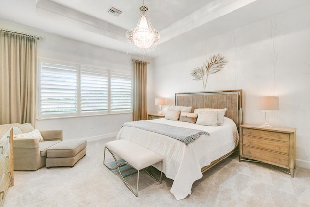 10948 SW Ivory Springs Ln, Port Saint Lucie, FL 34987 - bedroom featuring a chandelier, light carpet, and a tray ceiling