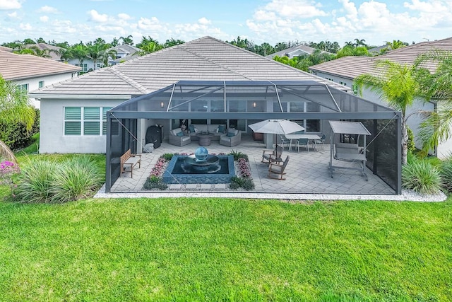 10948 SW Ivory Springs Ln, Port Saint Lucie, FL 34987 - back of house with an outdoor living space, a patio area, a lawn, and a lanai