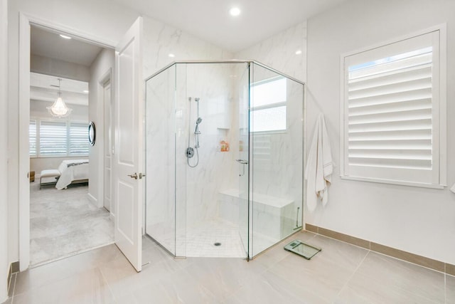 10948 SW Ivory Springs Ln, Port Saint Lucie, FL 34987 - bathroom with connected bathroom, healthy amount of natural light, a marble finish shower, tile patterned floors, and recessed lighting
