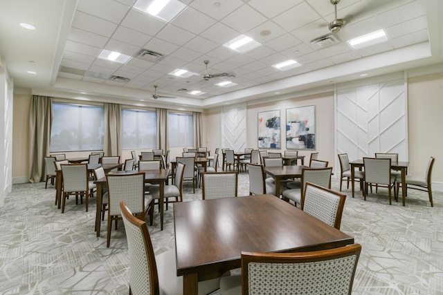 10948 SW Ivory Springs Ln, Port Saint Lucie, FL 34987 - dining space with light colored carpet and a tray ceiling