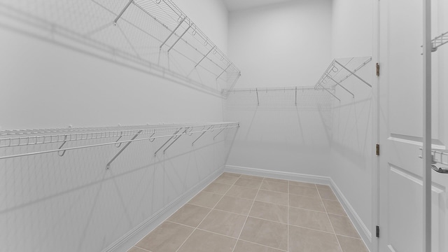 2165 SE Mosaic Blvd, Port Saint Lucie, FL 34984 - spacious closet with light tile patterned flooring