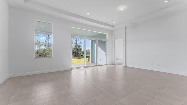 2165 SE Mosaic Blvd, Port Saint Lucie, FL 34984 - unfurnished room with recessed lighting and light tile patterned floors