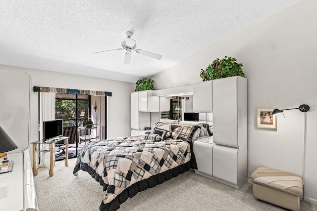 5020 Golfview Ct Unit 1422, Delray Beach, FL 33484 - bedroom featuring light carpet, a textured ceiling, and a ceiling fan