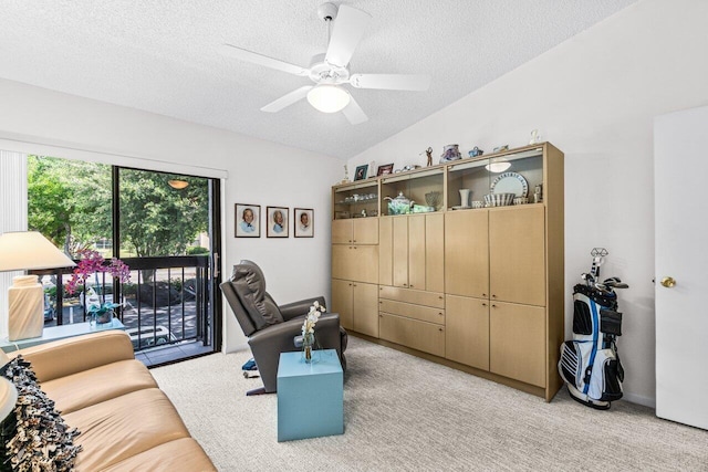 5020 Golfview Ct Unit 1422, Delray Beach, FL 33484 - sitting room featuring lofted ceiling, a textured ceiling, light carpet, and ceiling fan