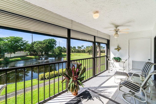 5020 Golfview Ct Unit 1422, Delray Beach, FL 33484 - sunroom with a water view, a ceiling fan, and plenty of natural light