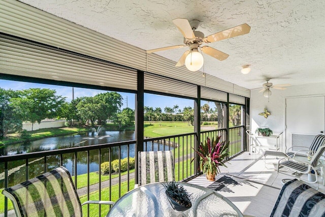 5020 Golfview Ct Unit 1422, Delray Beach, FL 33484 - sunroom featuring a ceiling fan, a water view, a textured ceiling, and outdoor dining space