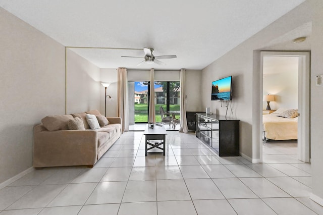 15451 Pembridge Dr Unit 207, Delray Beach, FL 33484 - living room with a ceiling fan and light tile patterned floors